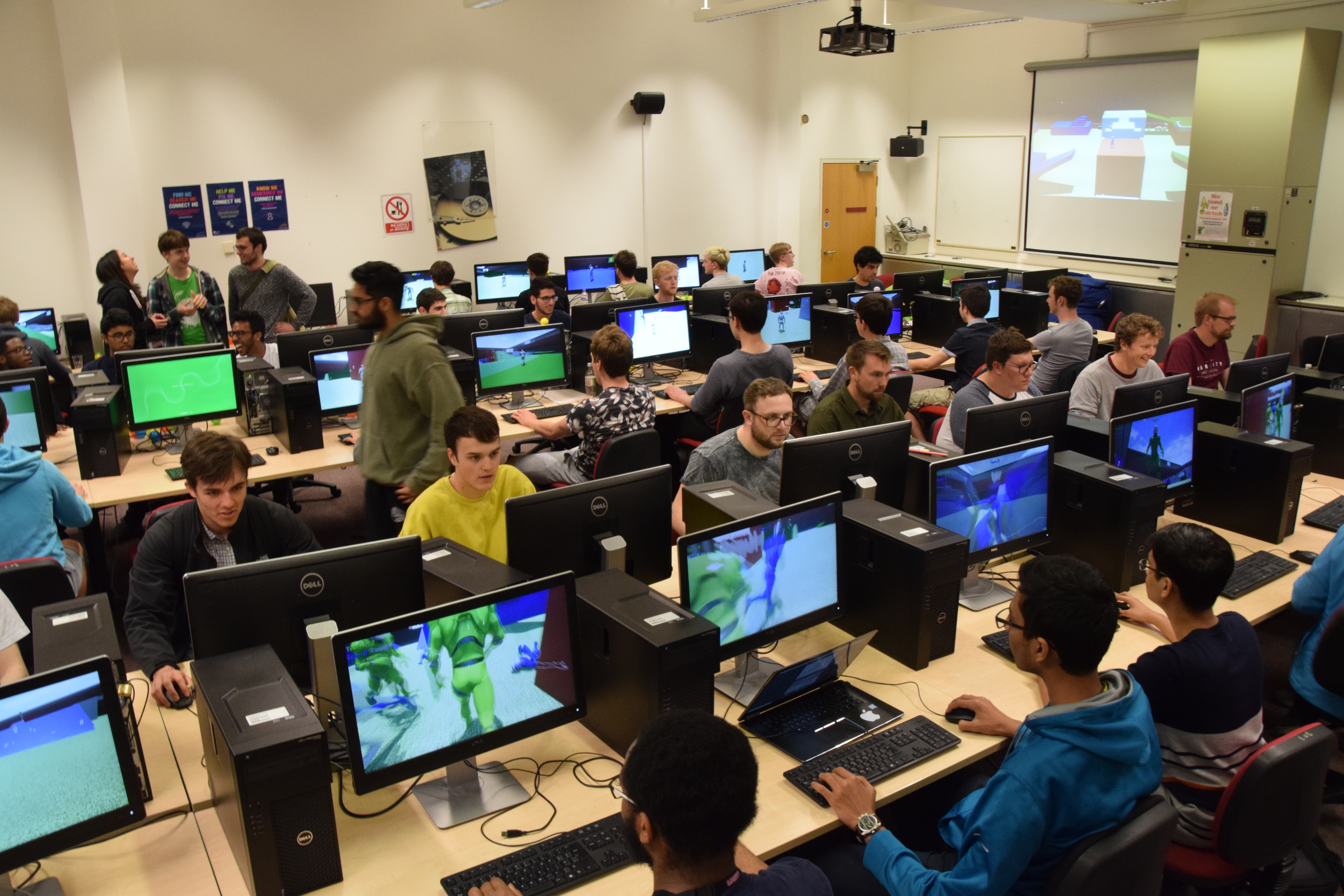 Classroom on games day with about 30 people playing and spectating the game